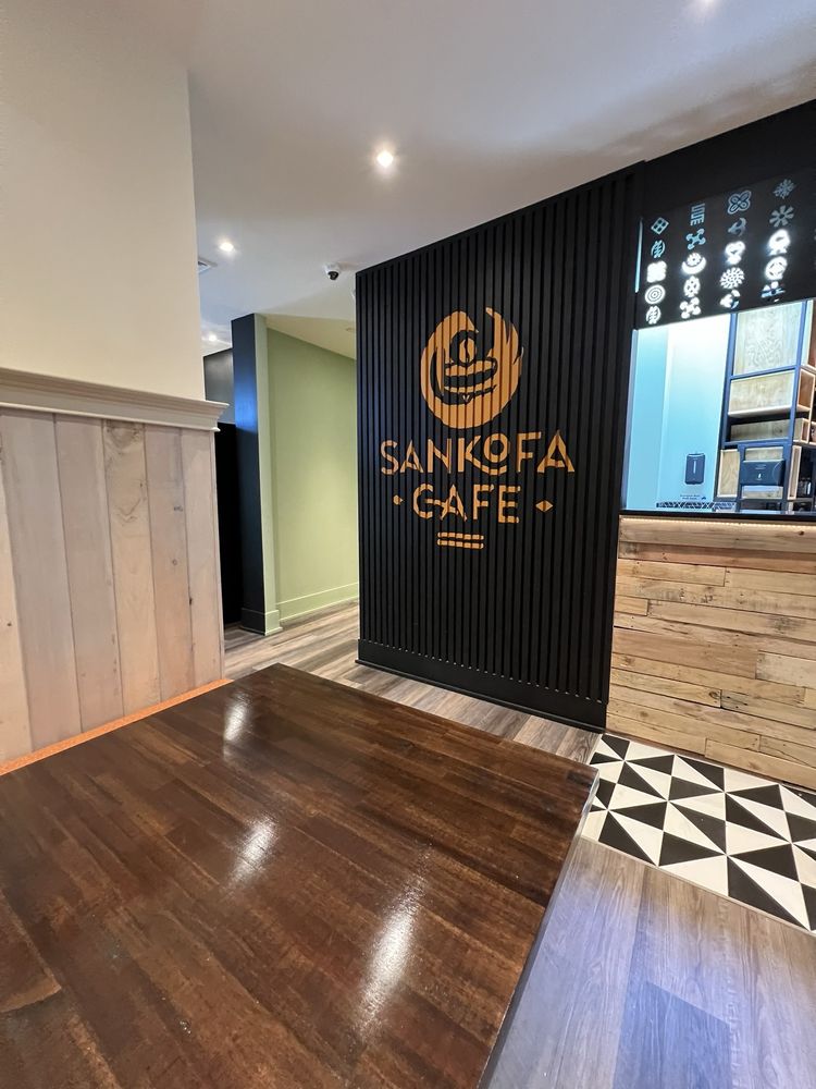 Sofas and tables inside Sankofa Cafe