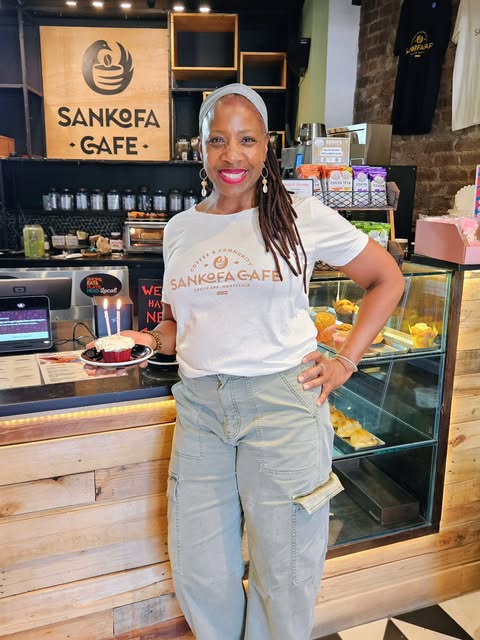 Sankofa Cafe owner Jessica Troupe behind the counter